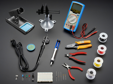 Collection of many electronic hand tools and soldering equipment