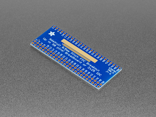 Angled shot of blue, rectangular FPC adapter board.