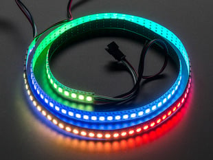 Adafruit NeoPixel Digital RGB LED Strip wired to a microcontroller, with all the LEDs in a rainbow