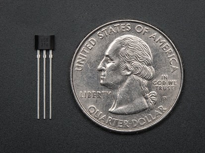 Hall effect sensor next to US quarter for scale. 