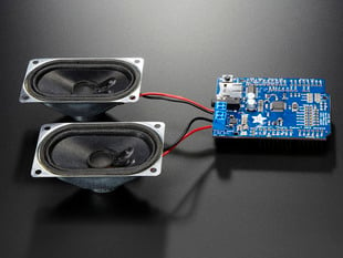 Adafruit "Music Maker" MP3 Shield for Arduino w/3W Stereo Amp connected to a set of speakers. 