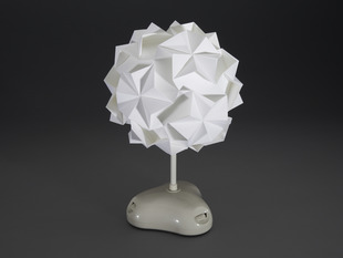 Angled shot of not powered on Origami LED Lamp Shade Kit.