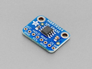 Angled shot of blue, rectangular FRAM breakout board.