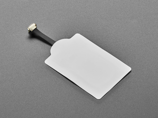 Angled shot of Universal Qi Wireless Charging Module - 20mm Reverse MicroUSB.