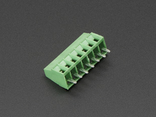 Angled shot of green 7-pin 2.54mm terminal block.