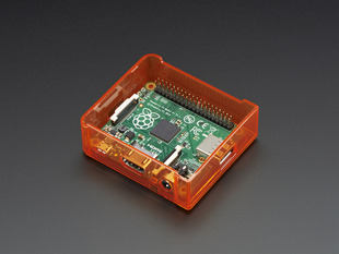 Angled shot of orange Raspberry Pi Model A+ Case without lid.