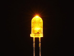 Single LED lit up bright yellow