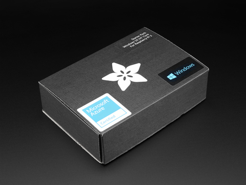 Angled shot of a black box with the white Adafruit star-flower logo.