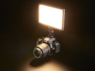 Camera-Mounted LED Photography Light lit warm white