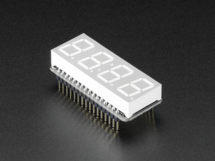 Angled shot of a rectangular shaped 7-segment breakout board with an LED matrix soldered on.