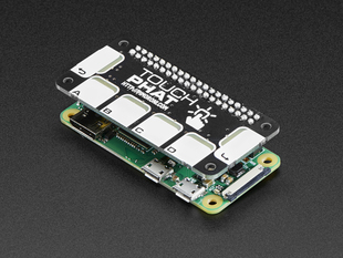 Angled shot of a Pimoroni Touch pHAT for Raspberry Pi Zero stacked on a Pi Zero. 