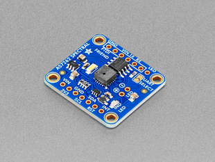 Angled shot of blue, square-shaped breakout board.