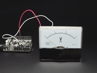 Video of an analog voltage panel meter. The needle sways back and forth.