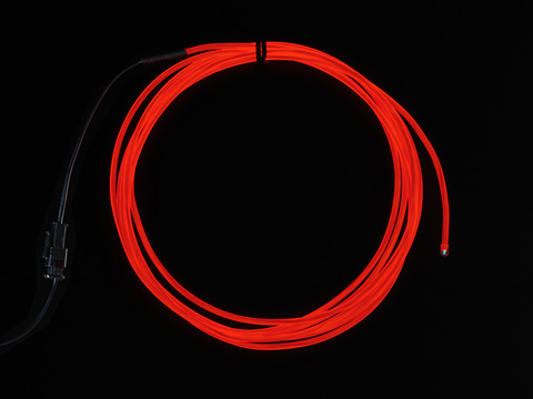 Coil of lit EL wire in red