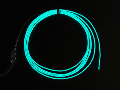 Coil of lit EL wire in aqua