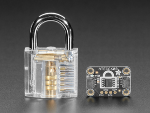 Adafruit ATECC608 Breakout Board  next to clear padlock