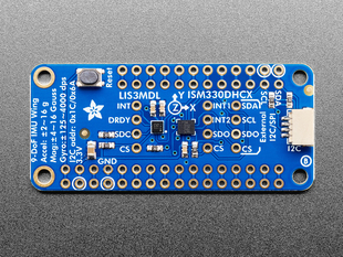 Overhead shot of blue, rectangular 9-DOF IMU sensor breakout.