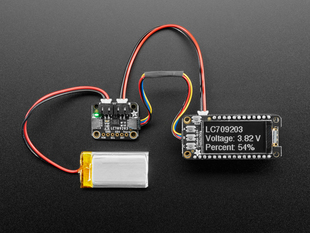 Top view of Adafruit LC709203F LiPoly / LiIon Fuel Gauge and Battery Monitor powered by a Lipoly battery and an OLED display.