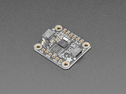 Angled shot of a Adafruit 9-DOF Orientation IMU Fusion Breakout board.