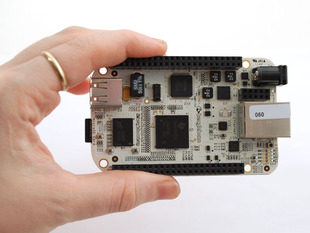 Hand holding Beagle Bone development board