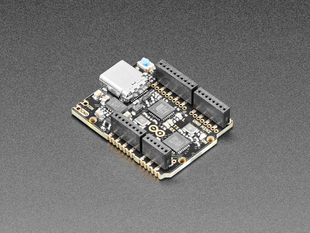 Angled shot of small microcontroller with female socket headers.