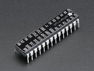 Angled shot of an Adafruit AVR Sticker for Breadboard Arduino-compatibles.