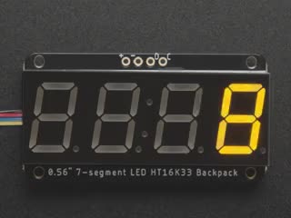 Overhead video of Adafruit 0.56" 4-Digit 7-Segment Display w/ I2C Backpack - Yellow.