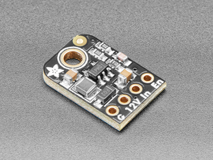 Angled shot of small, black, rectangular boost converter breakout board.