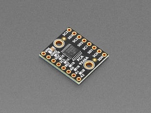 Angled shot of small, black, square I2C multiplexer.