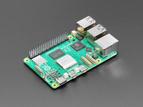 Angled shot of green Raspberry Pi microcontroller.