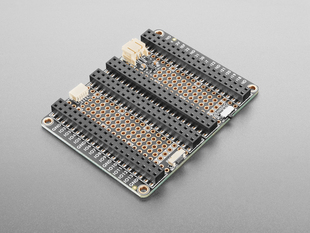 Angled shot of black, rectangular doubler prototyping board.