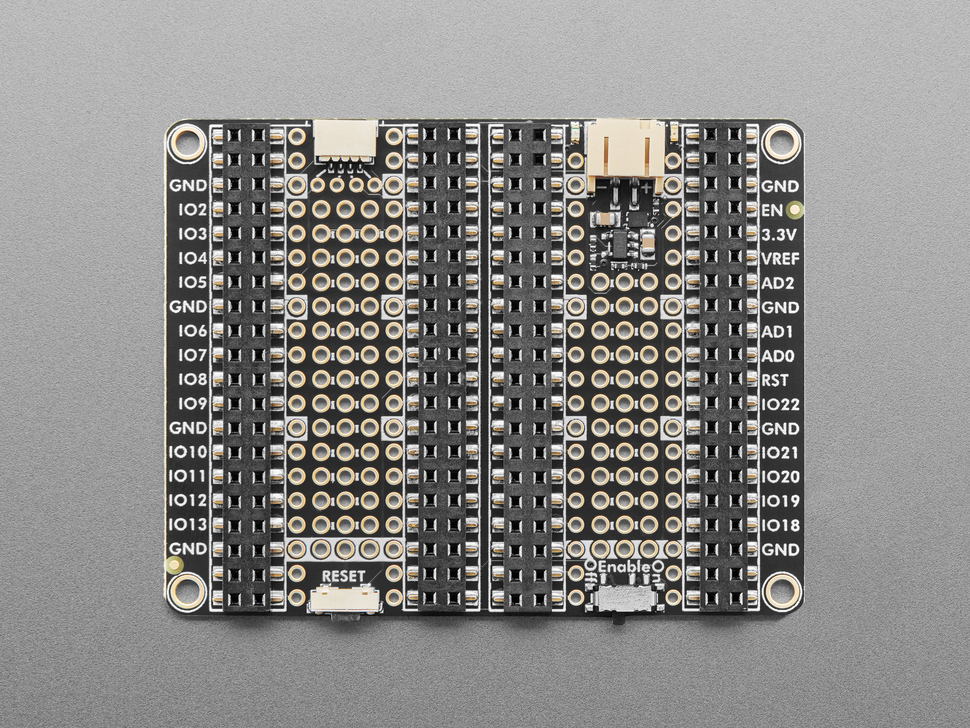 Overhead shot of black, rectangular doubler prototyping board.