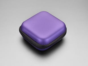 Angled shot of square-shaped purple zipper case.