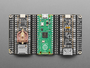 Overhead shot of tripler prototyping board with three long, rectangular boards.