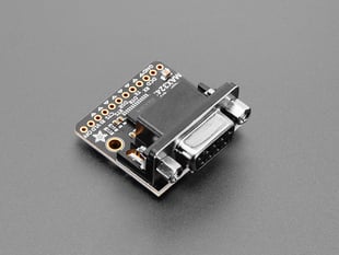 Angled shot of black, square-shaped USB-to-DE-9 serial adapter board.