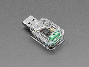 Angled shot of USB key PCB in a clear plastic enclosure.