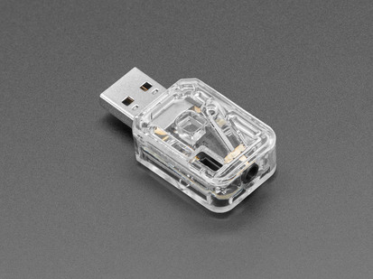 Angled shot of USB key PCB in a clear plastic enclosure.