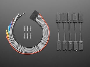 Overhead shot of probe cable with premium silicone ends, ten probe hooks, and 10 breadboard pins 