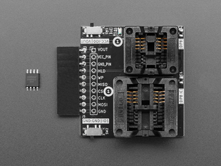 Overhead shot of SOP8 SPI flash adapter and SPI flash chip.