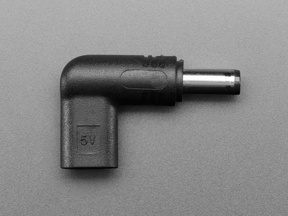 Overhead shot of barrel-jack-to-USB-C-socket right angle adapter, showing 5V.