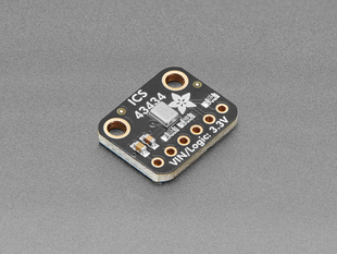 Angled shot of black, rectangle-shaped microphone breakout board.