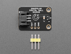 black, rectangular hall sensor breakout board above a stick of 3-pin header.