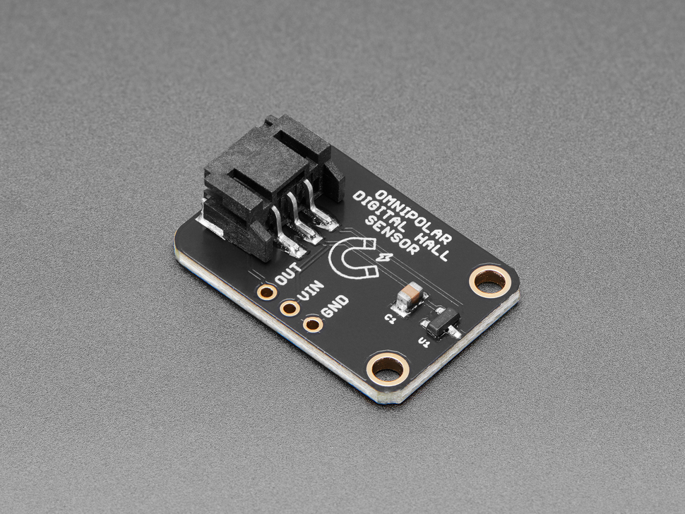 Angled shot of black, rectangular hall sensor breakout board.