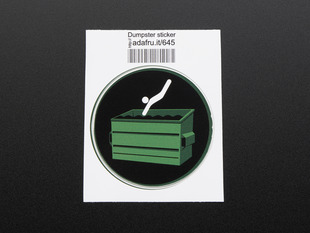 Circular sticker with green dumpster and a white stick figure mid-dive, on black background with green trim. Shown mounted on white paper with barcode. 