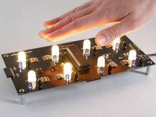 Hand waving over 2x4 warm white LED grid