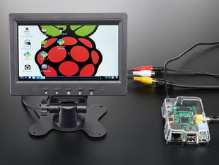 Enclosed TFT Television wired up to Raspberry Pi, showing off desktop screen.